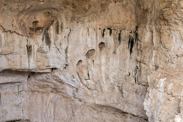 Rock formations at cave entrance