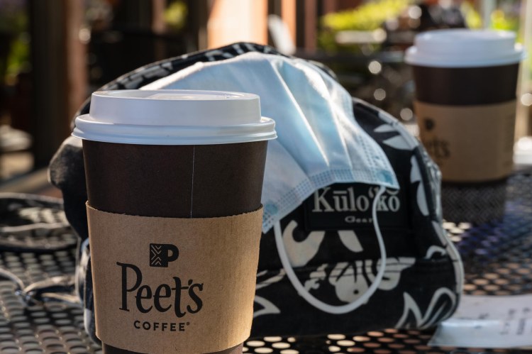 Peet's paper coffee cup, blue mask, Hawaiian style purse
