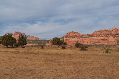 Red mountain cliffs and trees
