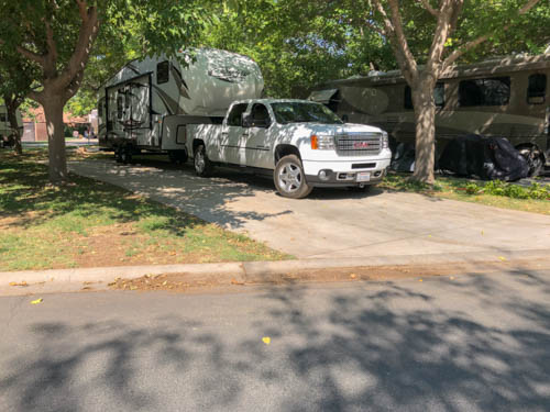 Rv and truck parked in campsite