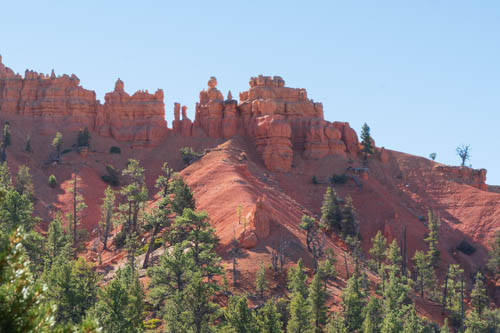 Red rock formations at the top of a mountain
