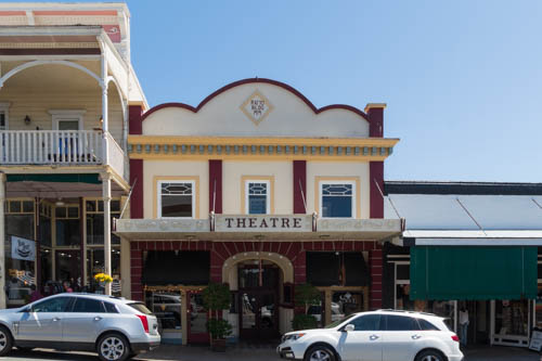 Art deco theatre painted cream with gold and maroon trim